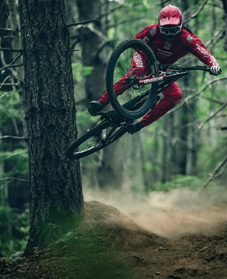 Rider shredding through forest